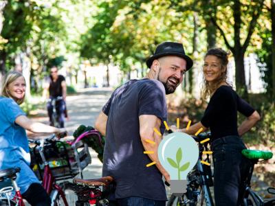 Menschen auf dem Fahrrad, die bei der Aktion Stadtradlen mitmachen.